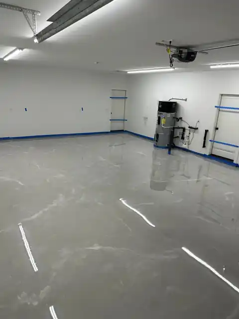 High-gloss solid grey epoxy floor in a garage